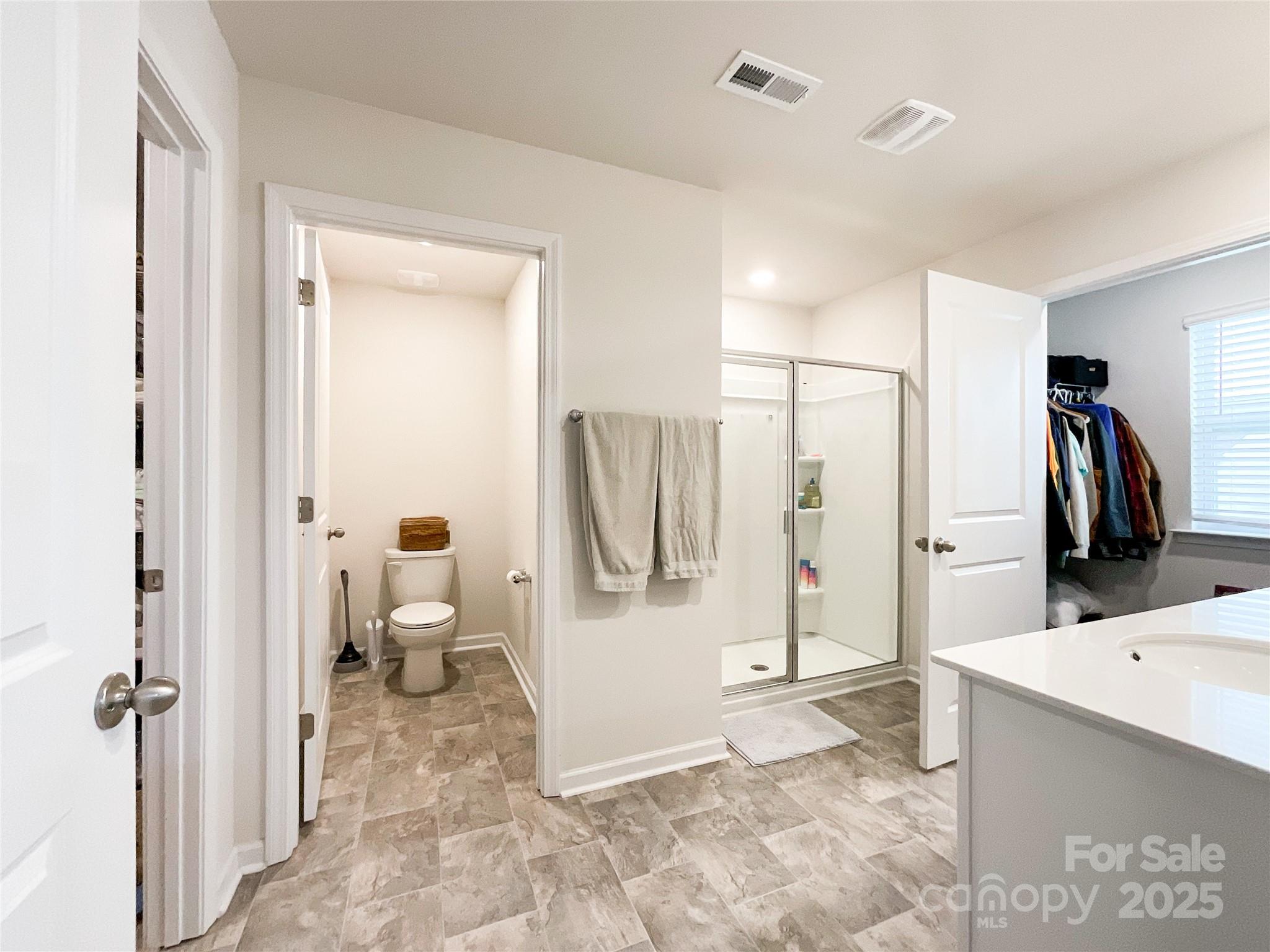 2159 Vanderlyn Street Monroe, NC 28112 - Photo 21 of 44 a bathroom with a tub sink and shower