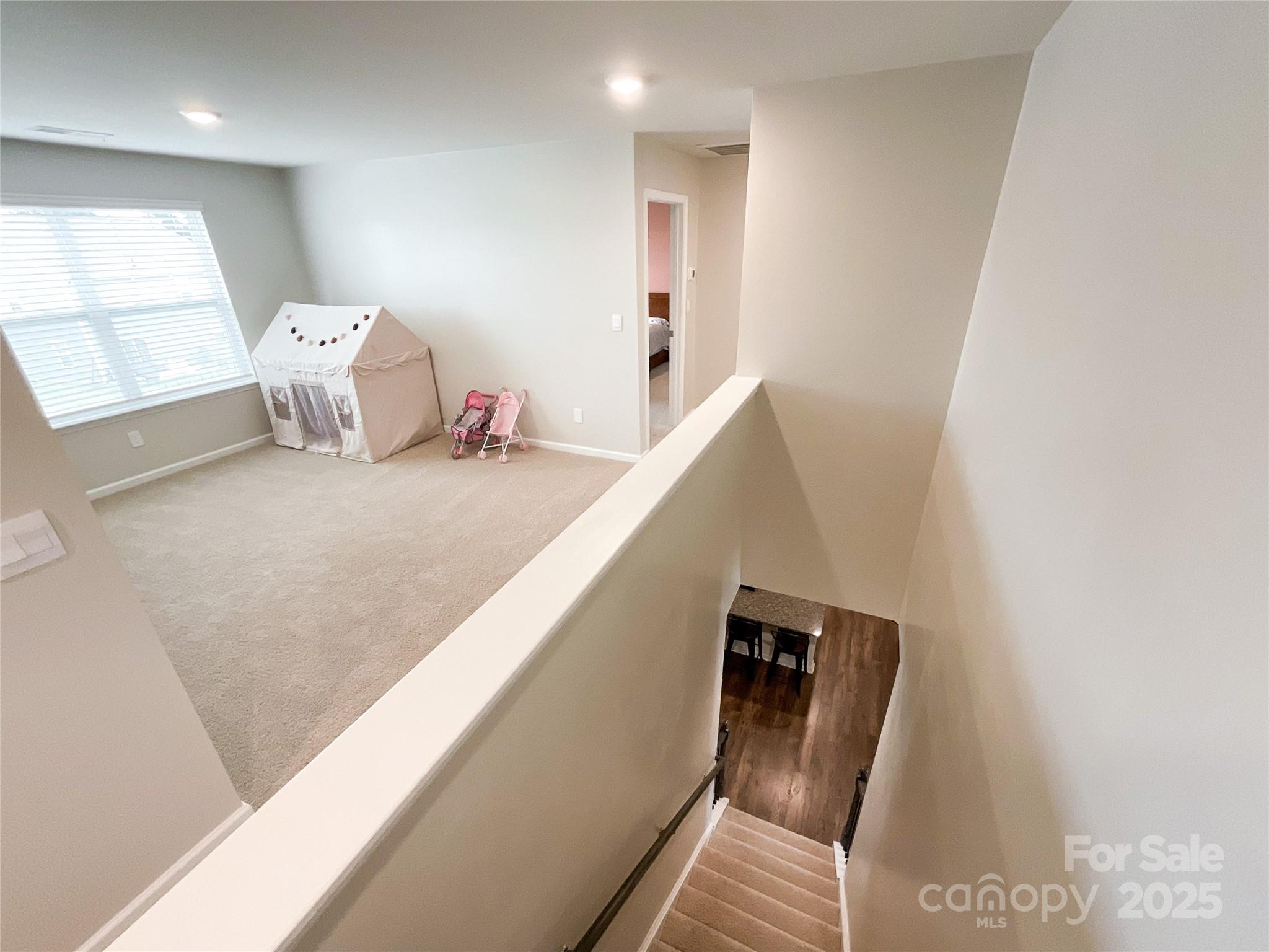 2159 Vanderlyn Street Monroe, NC 28112 - Photo 26 of 44 a view of a hallway with stairs