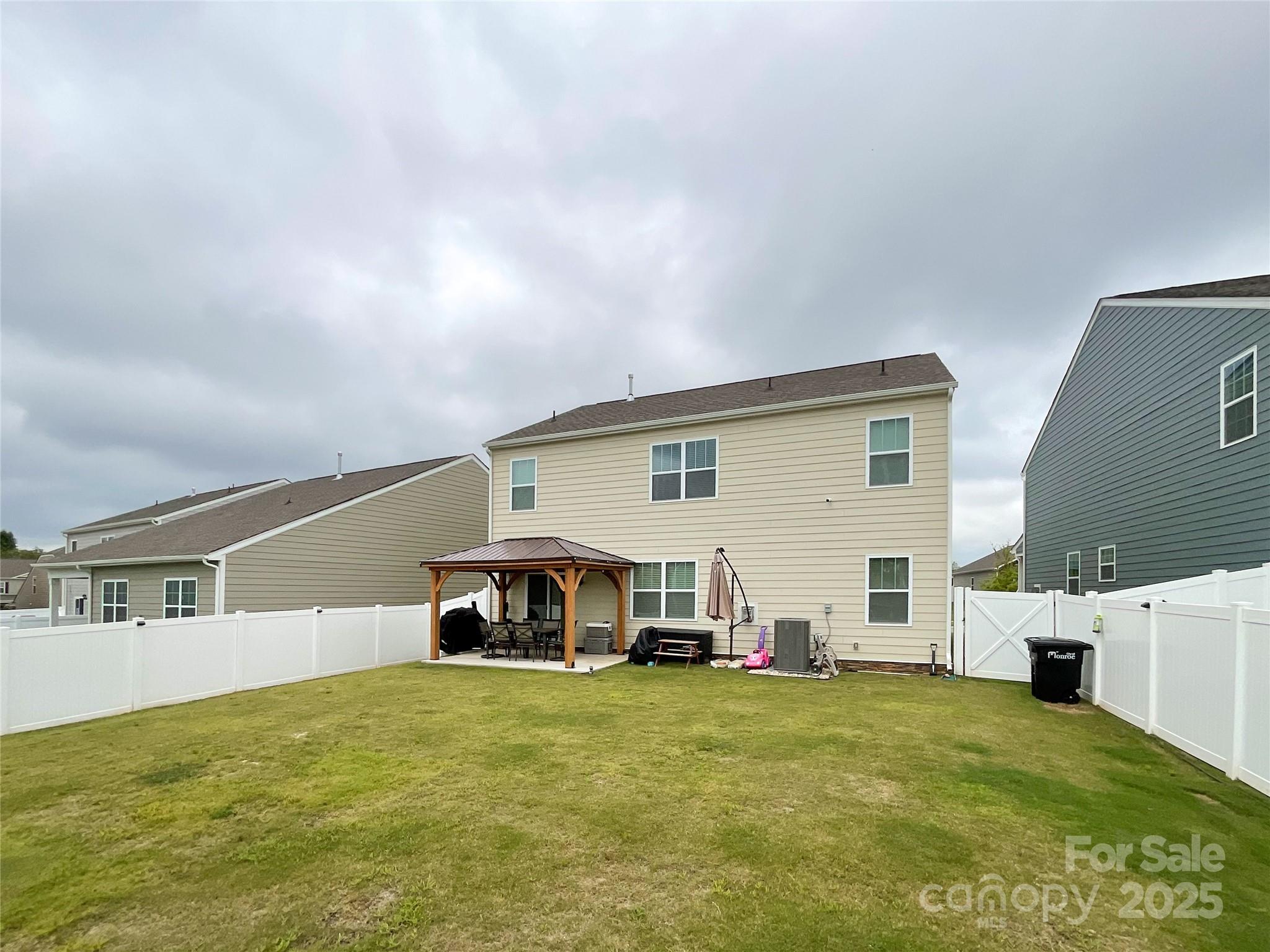 2159 Vanderlyn Street Monroe, NC 28112 - Photo 39 of 44 a view of a house with a backyard