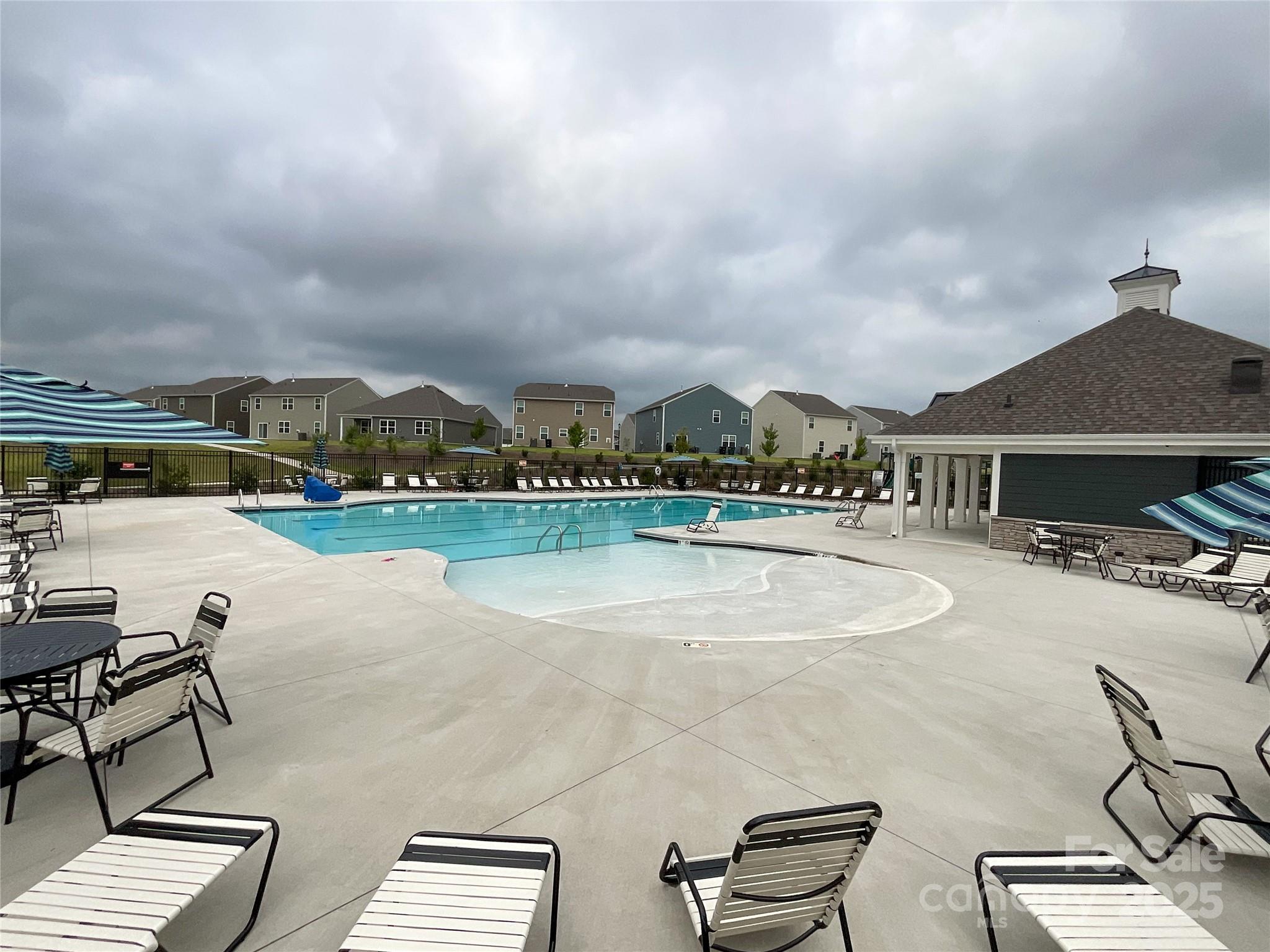 2159 Vanderlyn Street Monroe, NC 28112 - Photo 42 of 44 a view of swimming pool with seating area and furniture