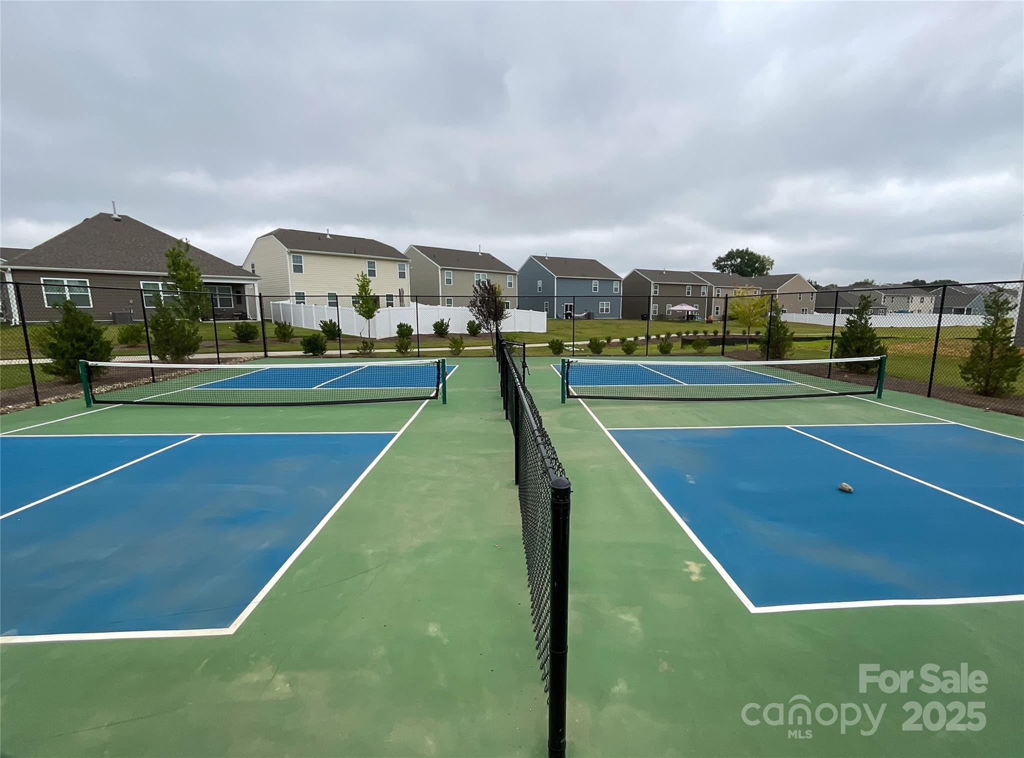 2159 Vanderlyn Street Monroe, NC 28112 - Photo 43 of 44 a view of swimming pool is middle in the middle of a field