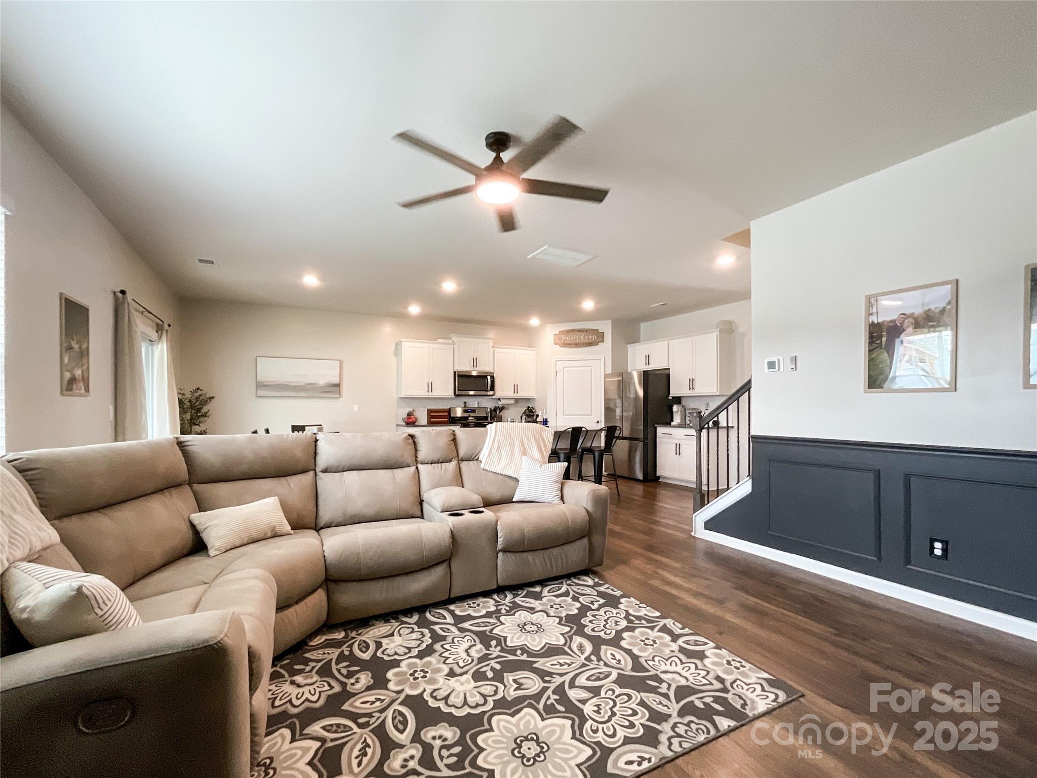 2159 Vanderlyn Street Monroe, NC 28112 - Photo 7 of 44 a living room with furniture and a rug