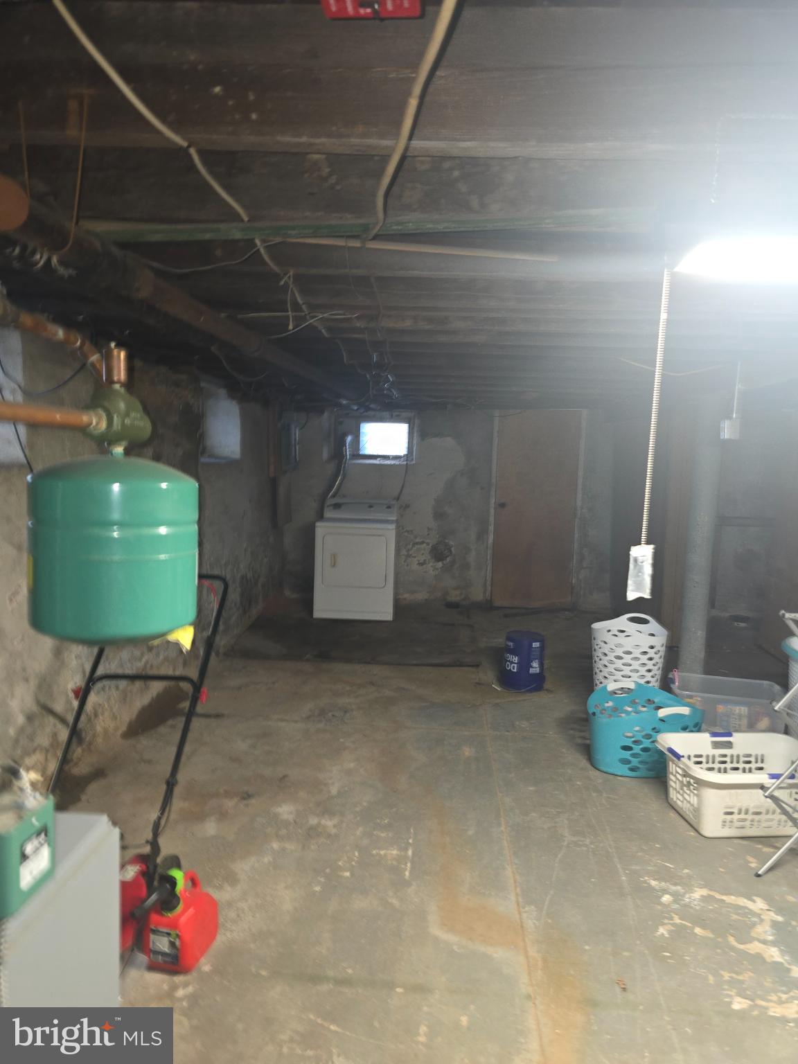 30 East Mowry Street Chester, PA 19013 - Photo 13 of 15 Spacious basement with potential for creativity.