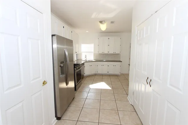 a bathroom with a sink and a shower