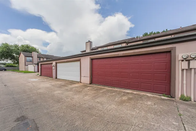 a view of backyard with large trees