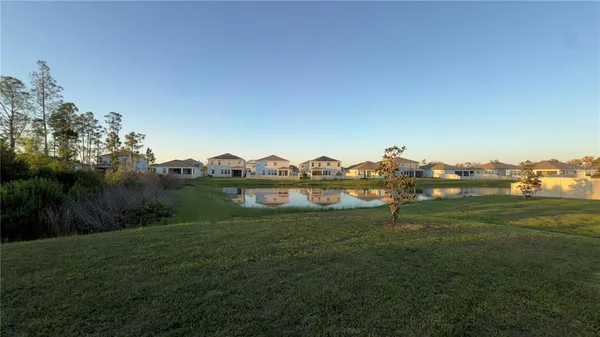 a view of a lake with houses