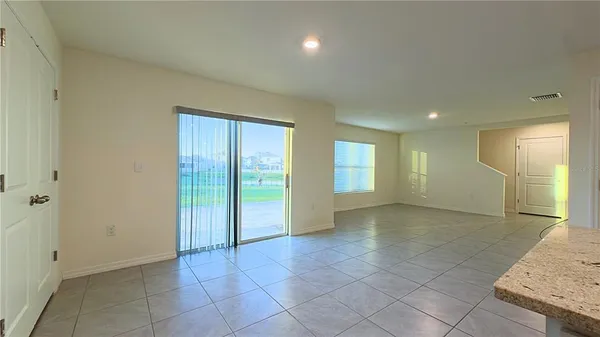 a view of a livingroom with a staircase
