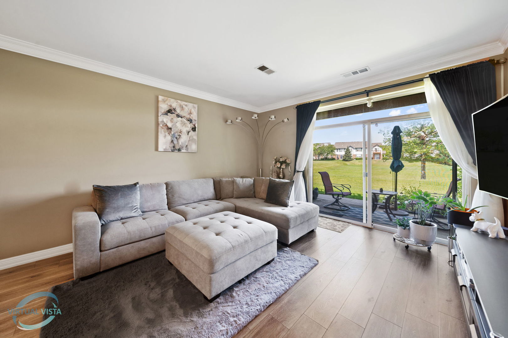 24155 Pear Tree Circle Plainfield, IL 60585 - Photo 5 of 27 a living room with furniture and a large window