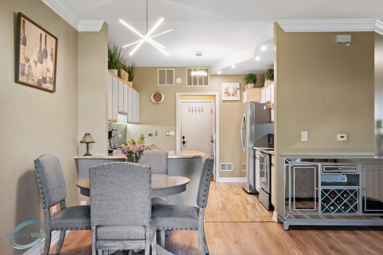 24155 Pear Tree Circle Plainfield, IL 60585 - Photo 10 of 27 a dining room with furniture and wooden floor