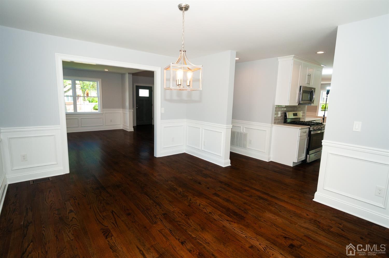 21 Stockton Road New Brunswick, NJ 08901 - Photo 15 of 45 a kitchen with hard wood floors and appliances