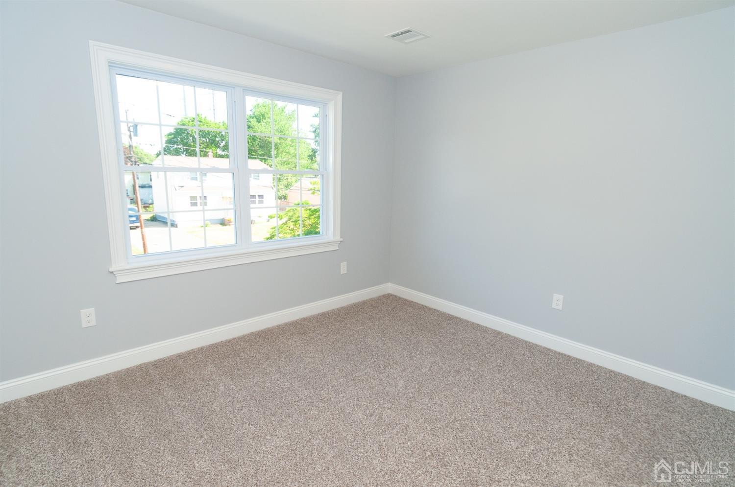 21 Stockton Road New Brunswick, NJ 08901 - Photo 23 of 45 an empty room with a window