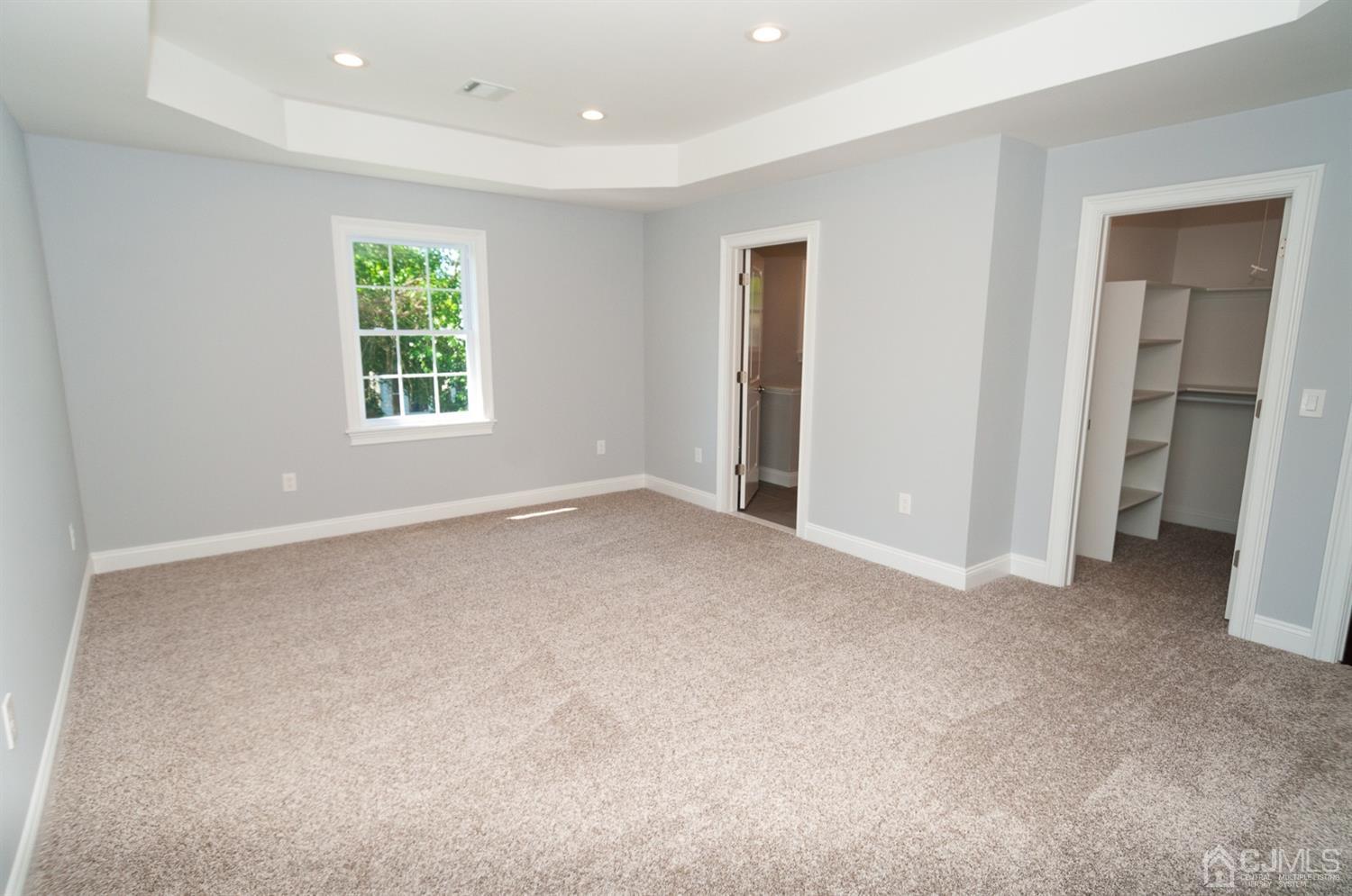21 Stockton Road New Brunswick, NJ 08901 - Photo 26 of 45 an empty room with windows and closet