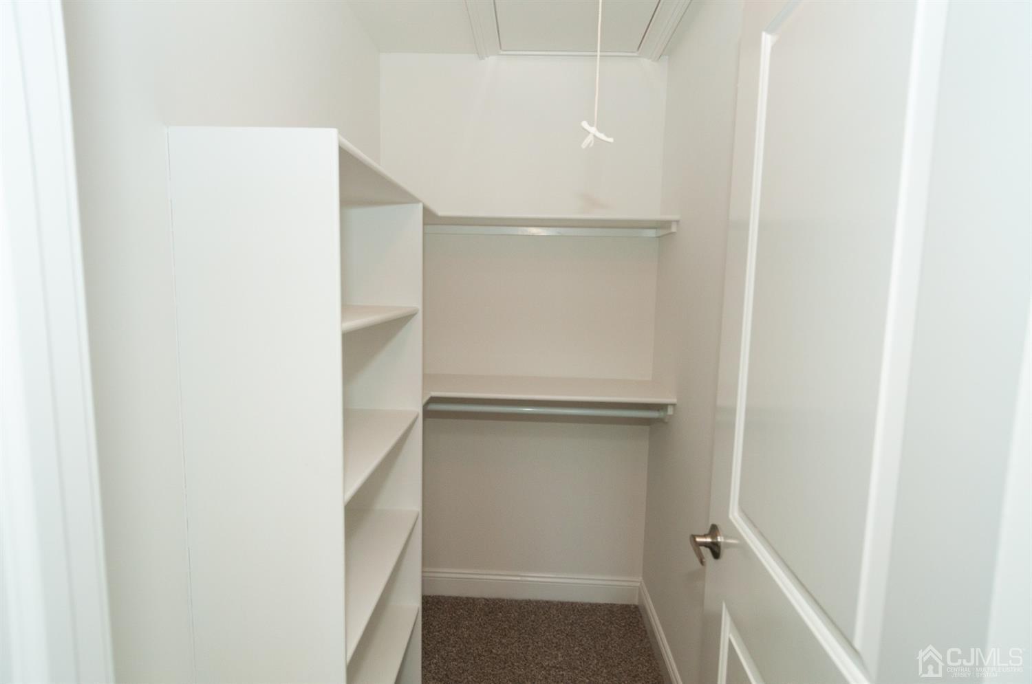 21 Stockton Road New Brunswick, NJ 08901 - Photo 29 of 45 a view of an empty walk in closet