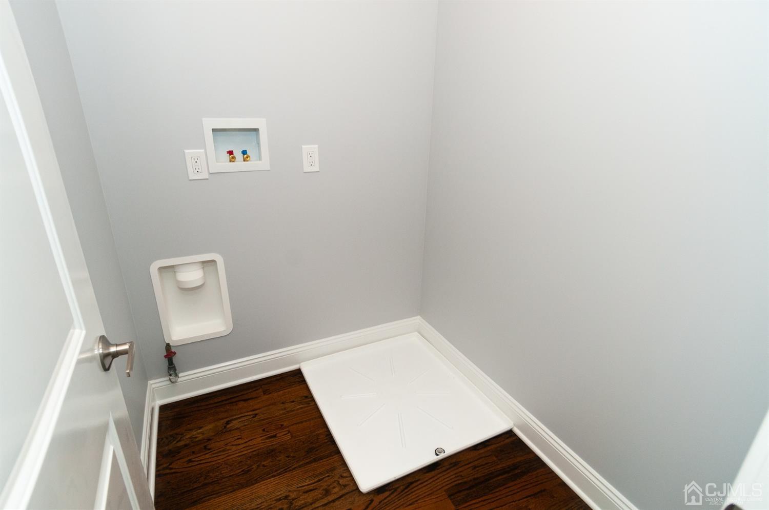 21 Stockton Road New Brunswick, NJ 08901 - Photo 33 of 45 a view of hallway with wooden floor
