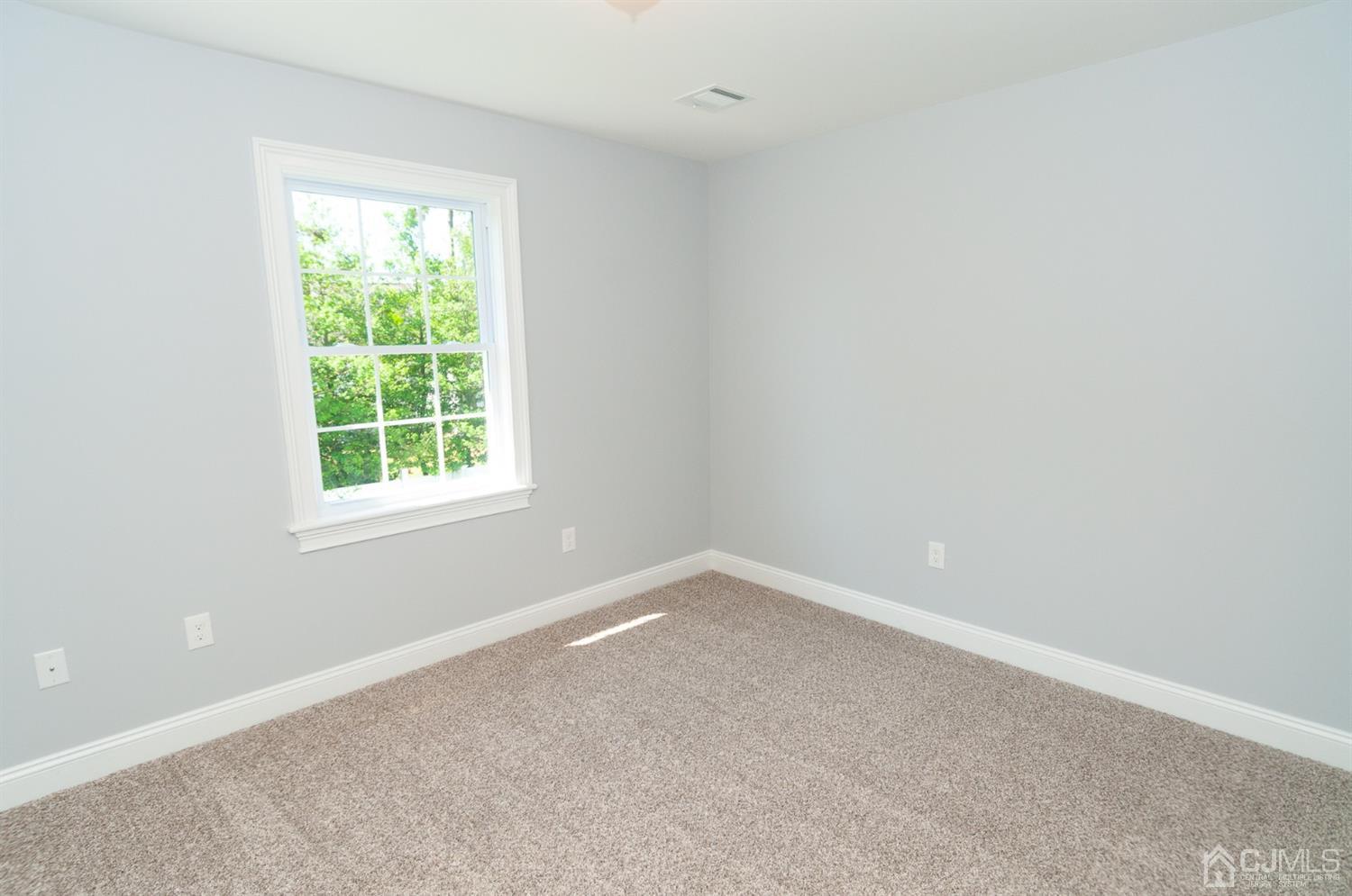 21 Stockton Road New Brunswick, NJ 08901 - Photo 34 of 45 an empty room with a window