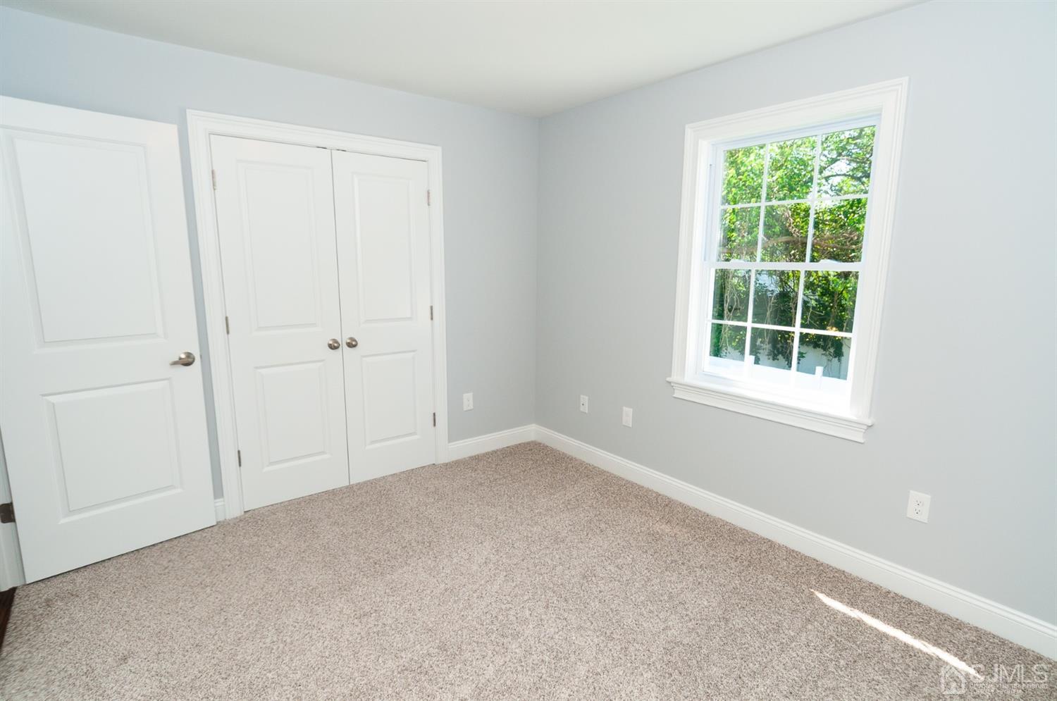 21 Stockton Road New Brunswick, NJ 08901 - Photo 35 of 45 a view of an empty room with a window