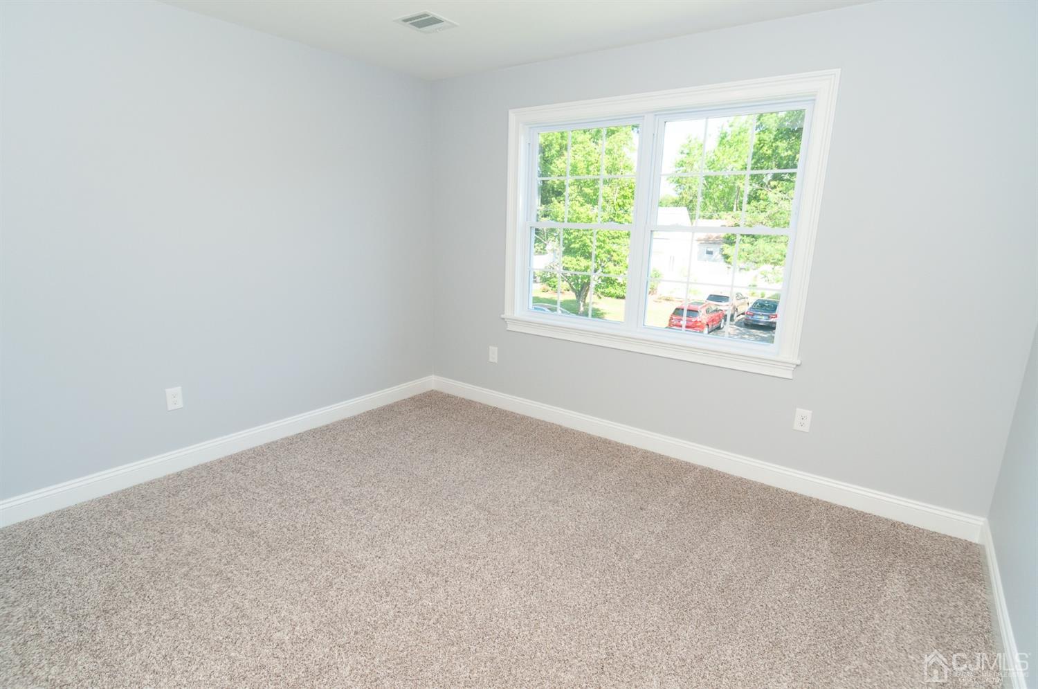 21 Stockton Road New Brunswick, NJ 08901 - Photo 38 of 45 an empty room with a window