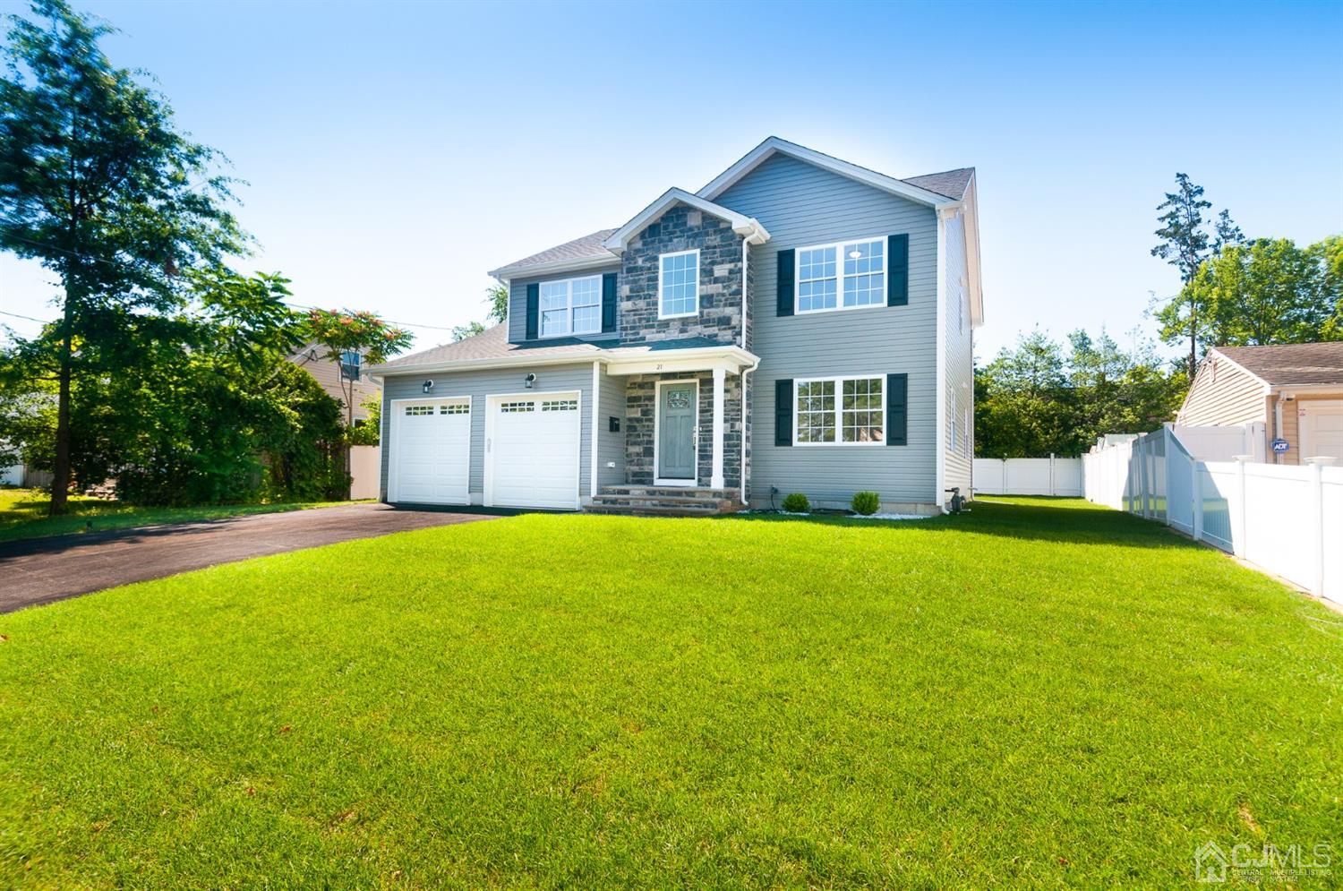 21 Stockton Road New Brunswick, NJ 08901 - Photo 42 of 45 a front view of a house with a garden