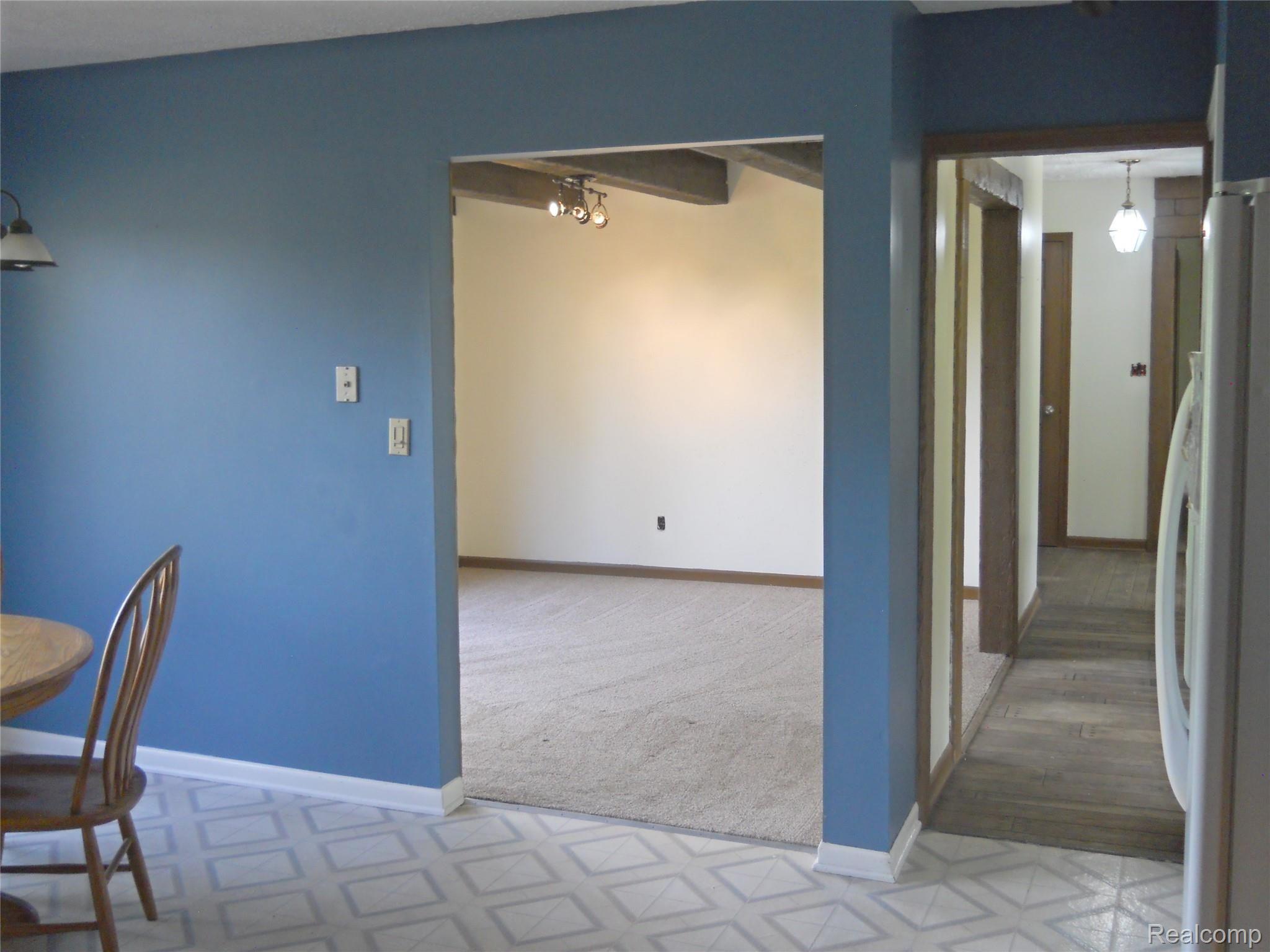 5929 Layton Road Fowlerville, MI 48836 - Photo 9 of 24 kitchen towards formal dining rm