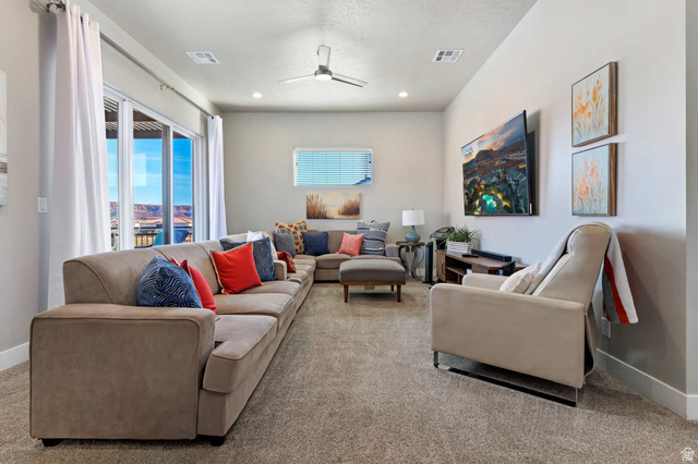 2600 Ocotillo Way, Unit 31 Santa Clara, UT 84765 - Photo 28 of 73 Spacious living area featuring light gray walls, recessed lighting, and a contemporary ceiling fan