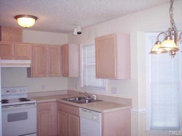 2038 Compacta Drive Wendell, NC 27591 - Photo 2 of 8 Bright kitchen looks out onto back yard.