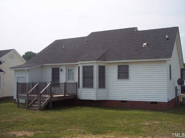 2038 Compacta Drive Wendell, NC 27591 - Photo 7 of 8 Deck overlooks large and open back yard - great for entertaining!