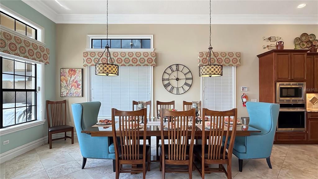 451 Muirfield Loop Reunion, FL 34747 - Photo 23 of 67 a view of a dining room with furniture
