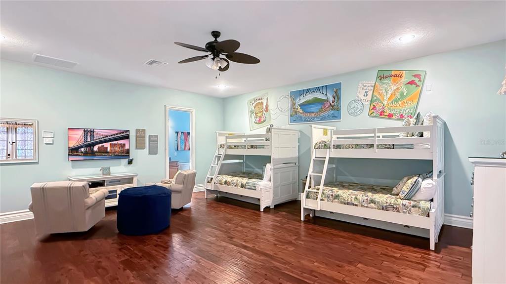 451 Muirfield Loop Reunion, FL 34747 - Photo 36 of 67 a living room with furniture and a fireplace