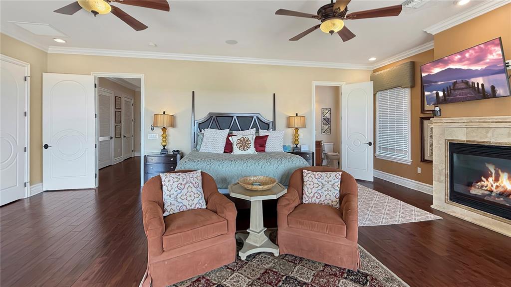451 Muirfield Loop Reunion, FL 34747 - Photo 43 of 67 a living room with furniture and a fireplace
