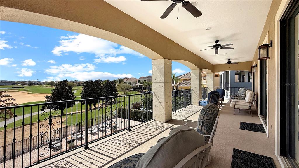 451 Muirfield Loop Reunion, FL 34747 - Photo 44 of 67 a view of balcony with couch