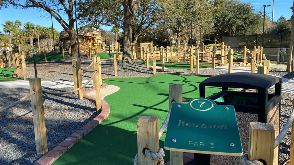 451 Muirfield Loop Reunion, FL 34747 - Photo 65 of 67 a view of a park with seating area