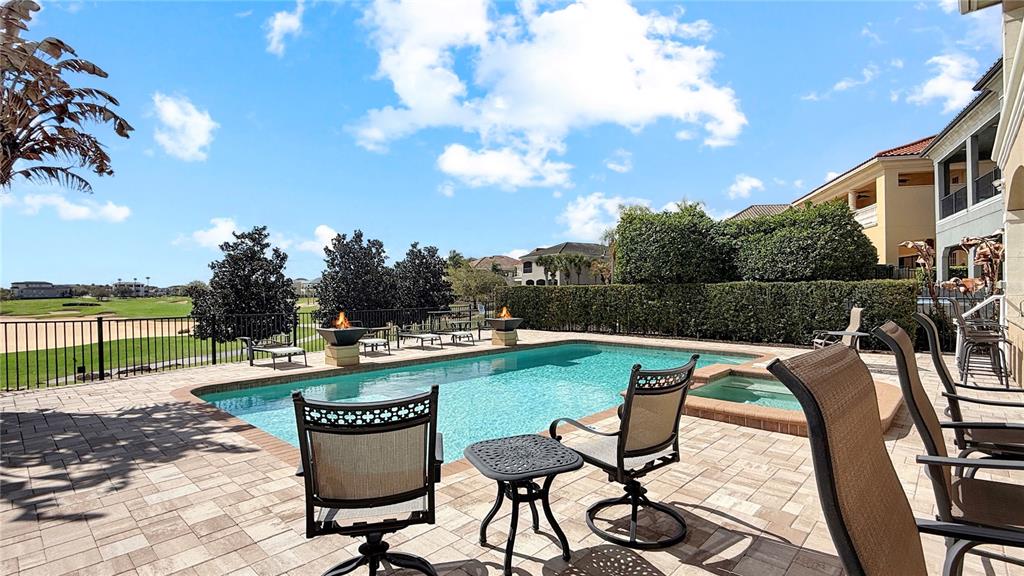 451 Muirfield Loop Reunion, FL 34747 - Photo 7 of 67 a view of a chairs and table in the patio