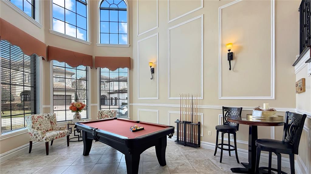 451 Muirfield Loop Reunion, FL 34747 - Photo 10 of 67 a dining room with furniture and wooden floor
