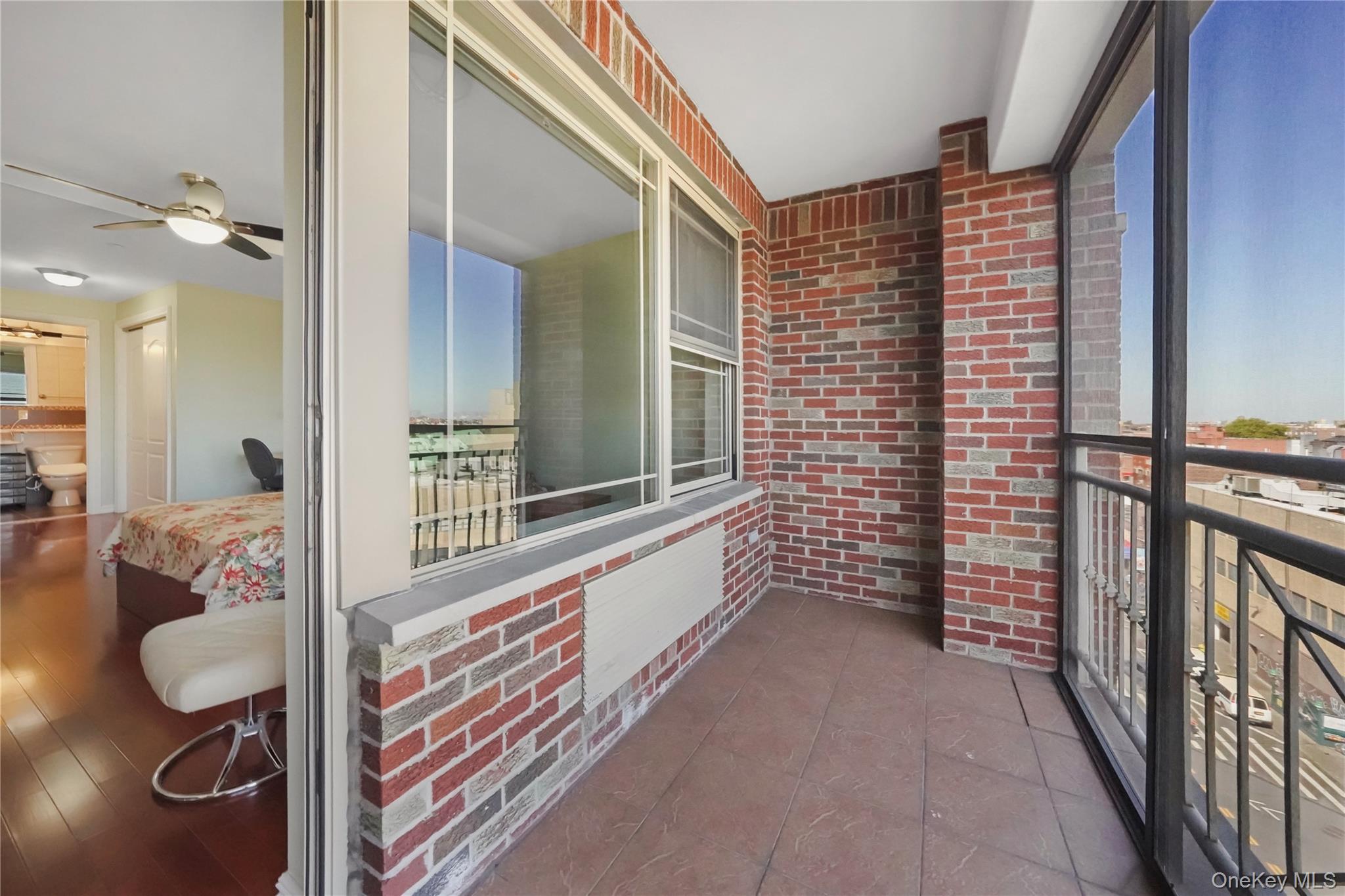 40-40 75th Street, Unit 7C Queens, NY 11373 - Photo 17 of 33 Balcony with a ceiling fan
