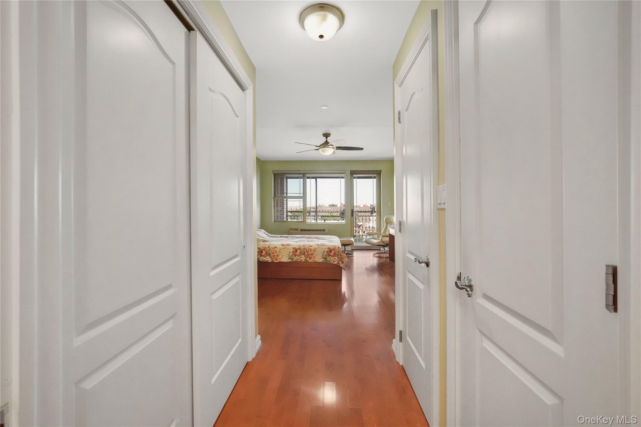 40-40 75th Street, Unit 7C Queens, NY 11373 - Photo 20 of 33 Corridor featuring dark wood-style floors