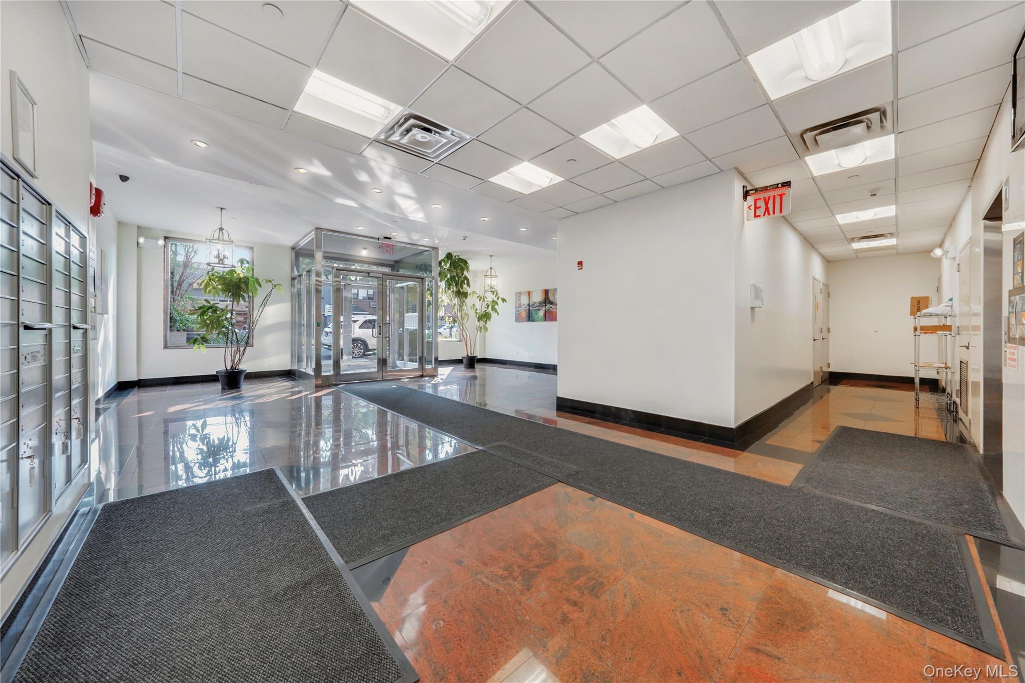 40-40 75th Street, Unit 7C Queens, NY 11373 - Photo 26 of 33 Community lobby with a paneled ceiling