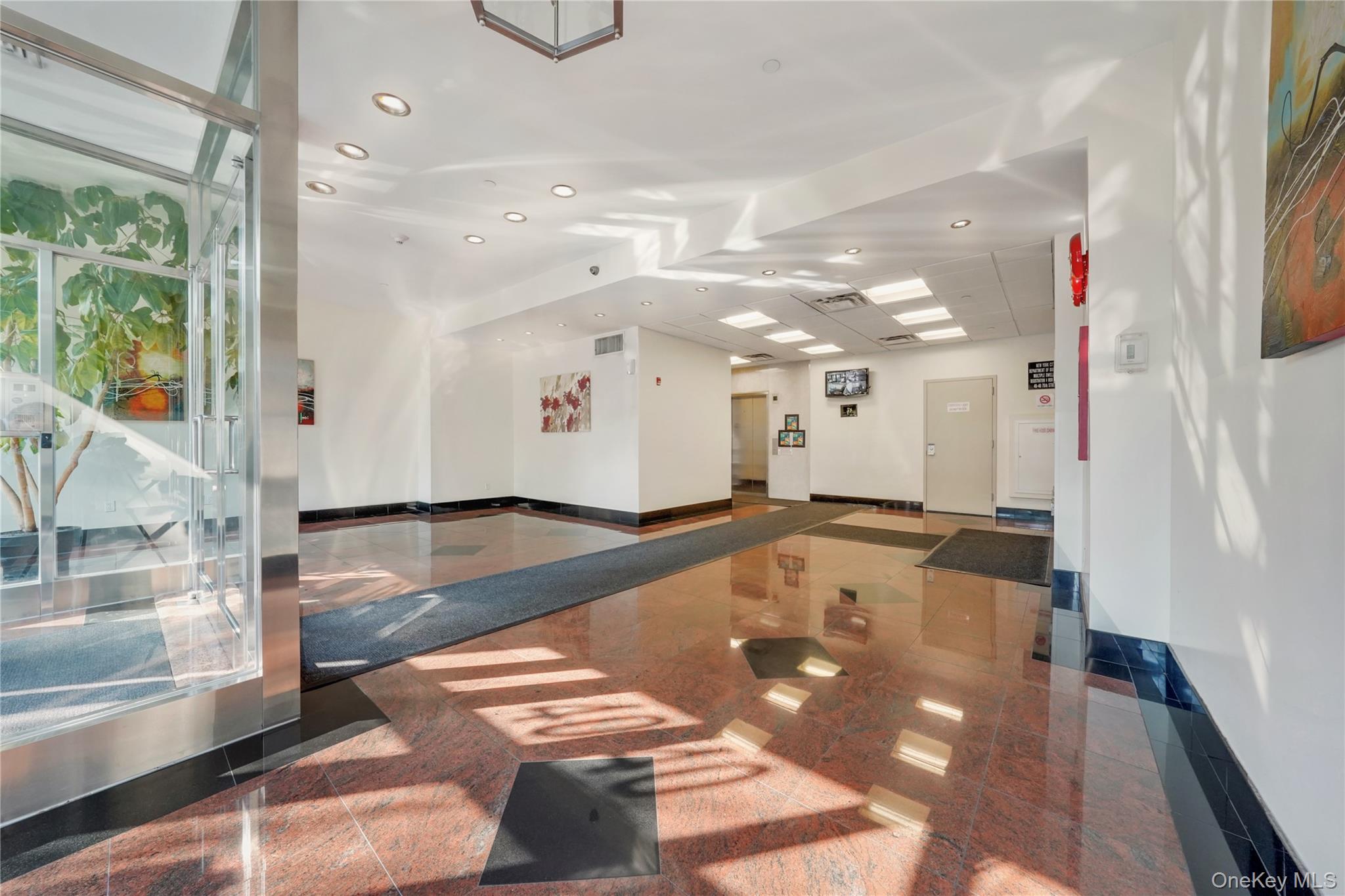 40-40 75th Street, Unit 7C Queens, NY 11373 - Photo 27 of 33 Lobby with recessed lighting