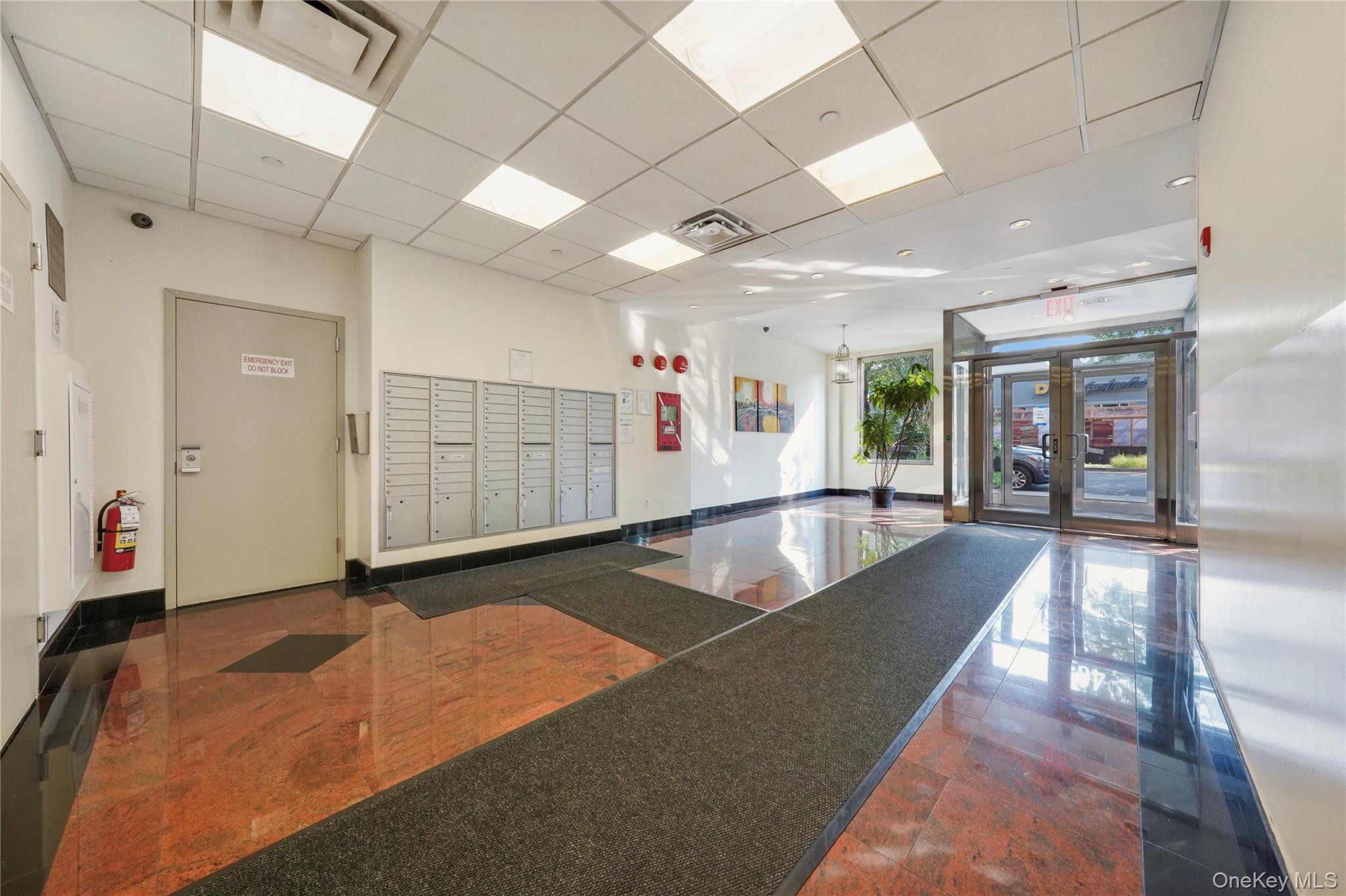 40-40 75th Street, Unit 7C Queens, NY 11373 - Photo 30 of 33 Lobby with a paneled ceiling