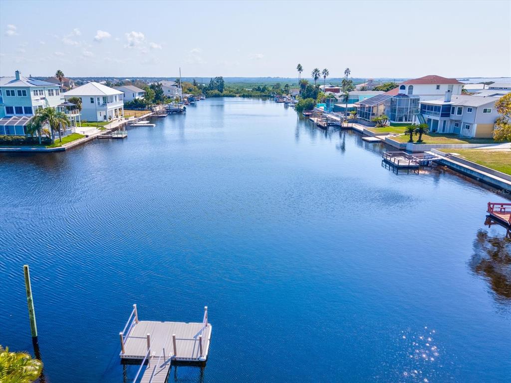 4230 Orchid Drive Hernando Beach, FL 34607 - Photo 17 of 36 an outdoor space with lounge chairs