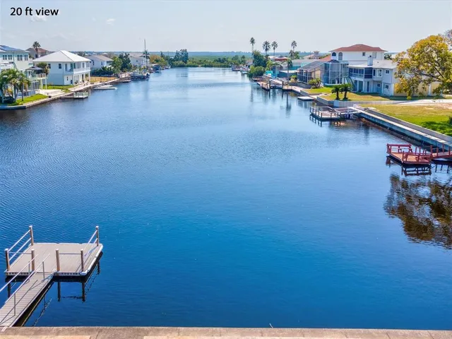 a view of swimming pool with furniture