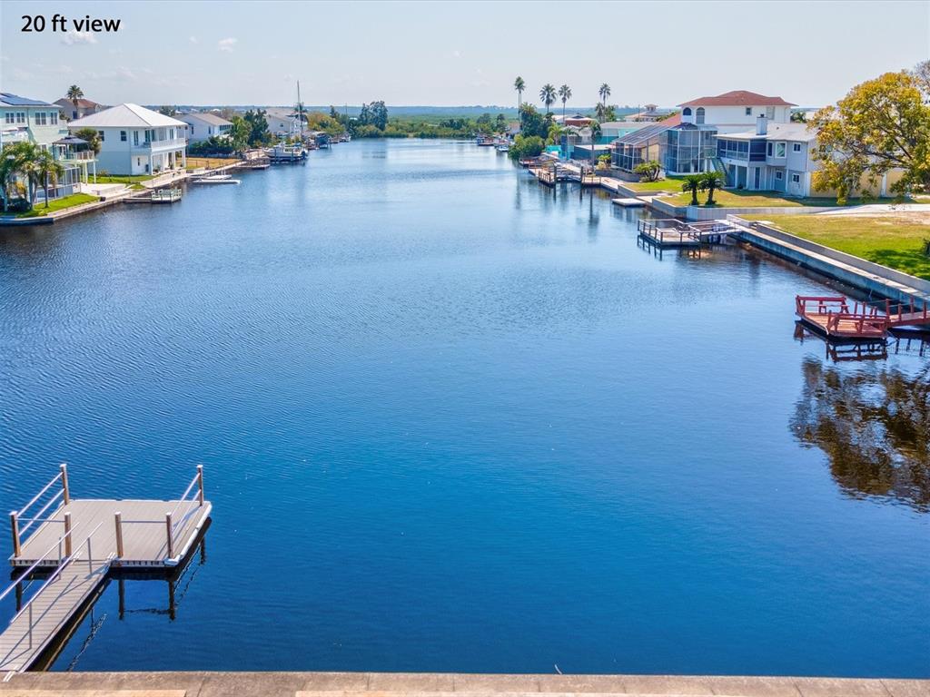 4230 Orchid Drive Hernando Beach, FL 34607 - Photo 3 of 36 an outdoor space with lounge chairs