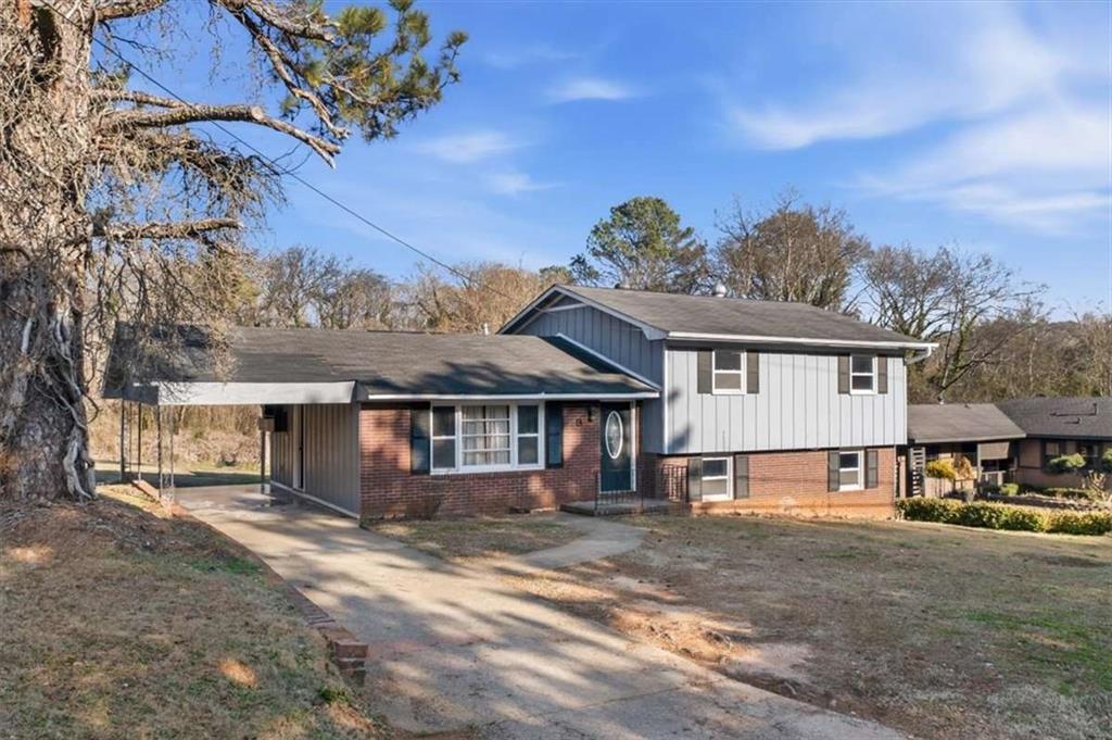 front view of a house with a yard