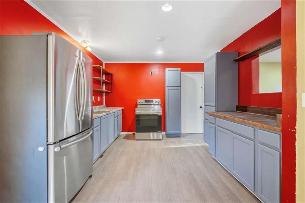 9 Atteiram Drive Rome, GA 30161 - Photo 13 of 29 a view of kitchen with stainless steel appliances granite countertop a refrigerator and a sink