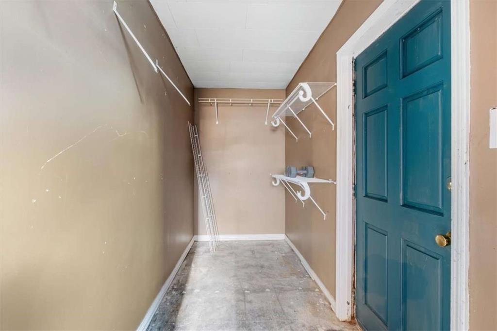 9 Atteiram Drive Rome, GA 30161 - Photo 28 of 29 a view of a hallway with white walls and stairs