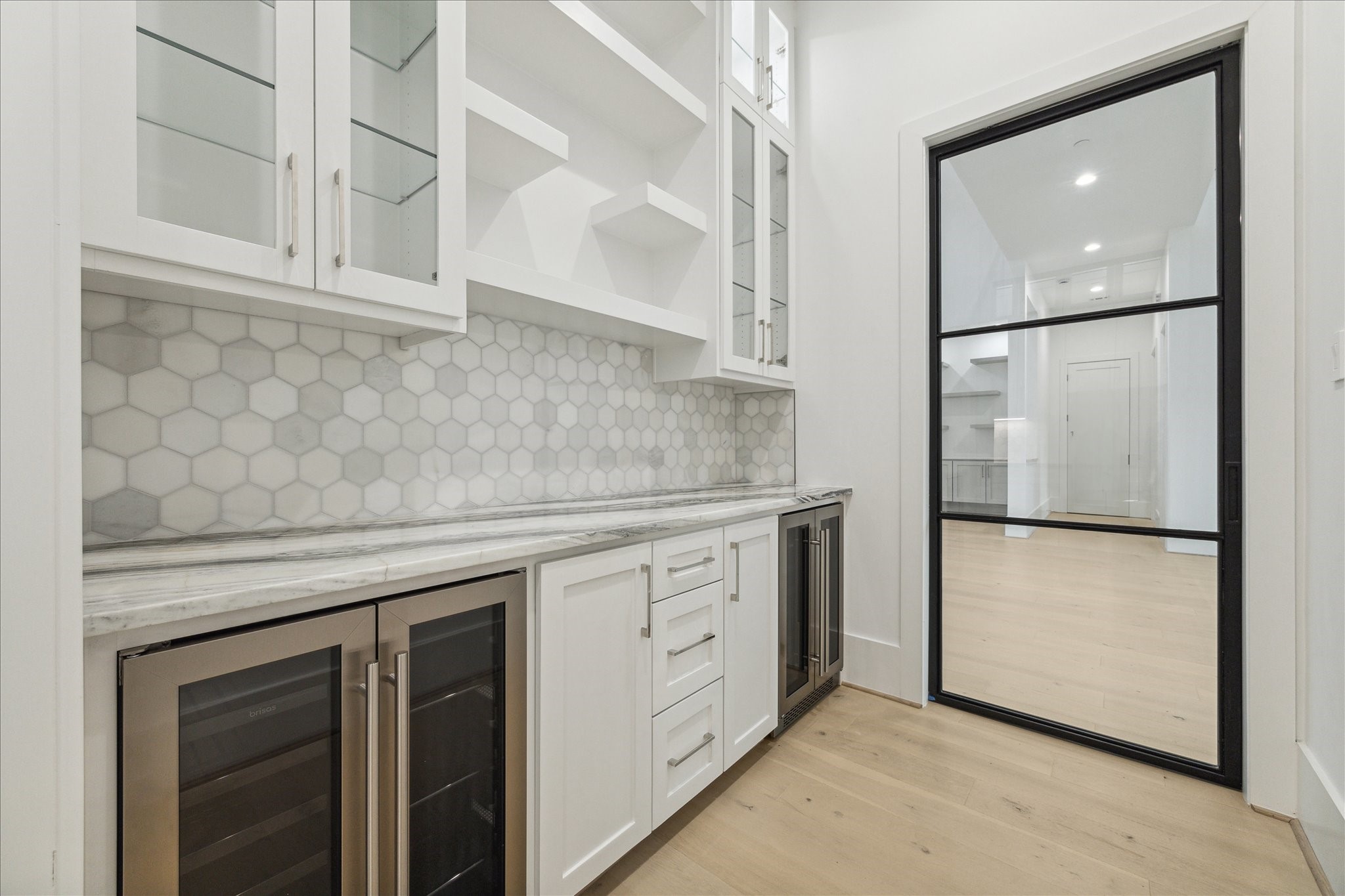 534 Lanecrest Lane Houston, TX 77024 - Photo 17 of 49 a kitchen with white cabinets and white refrigerator