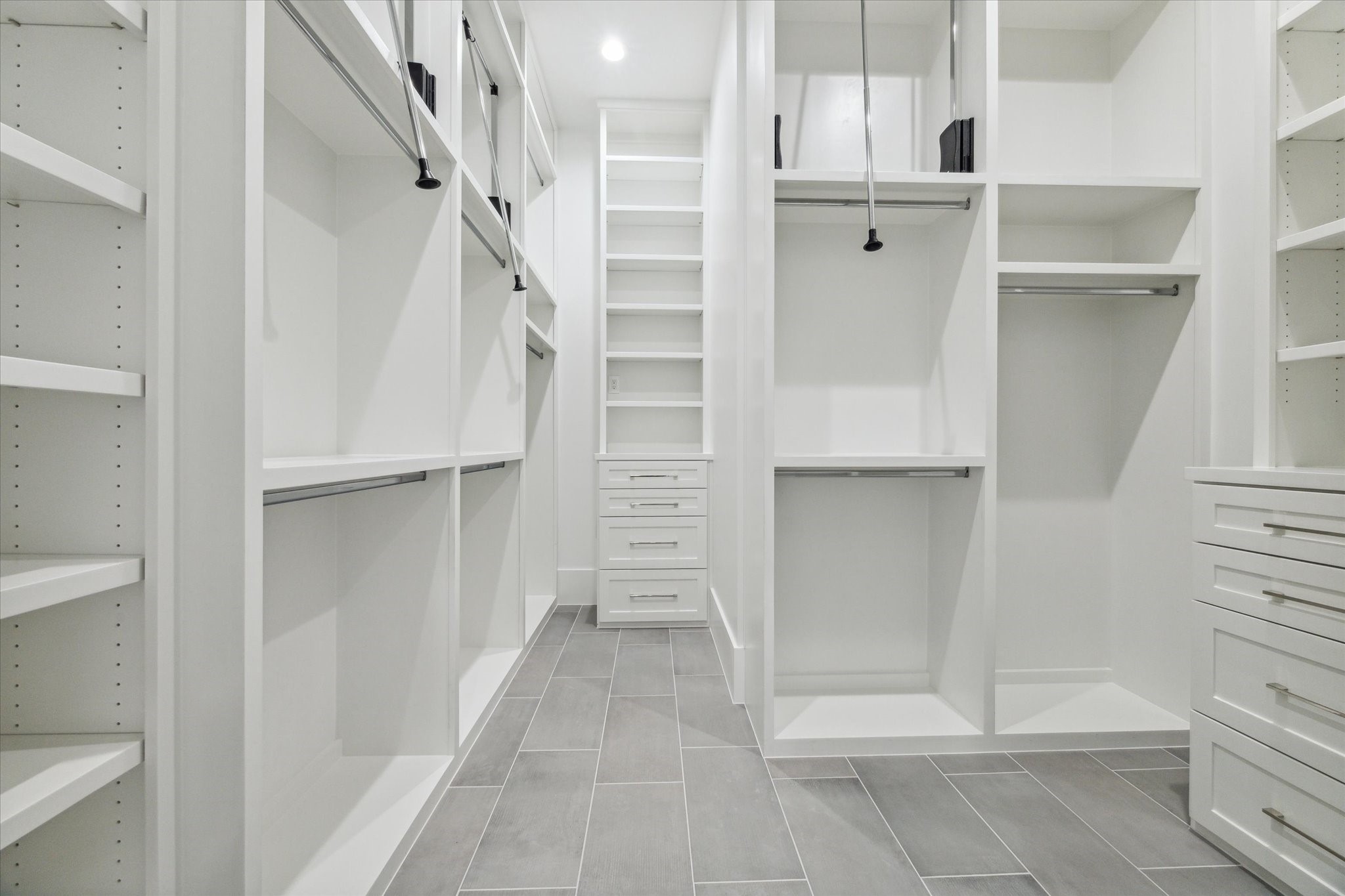 534 Lanecrest Lane Houston, TX 77024 - Photo 25 of 49 a view of walk in closet with empty racks