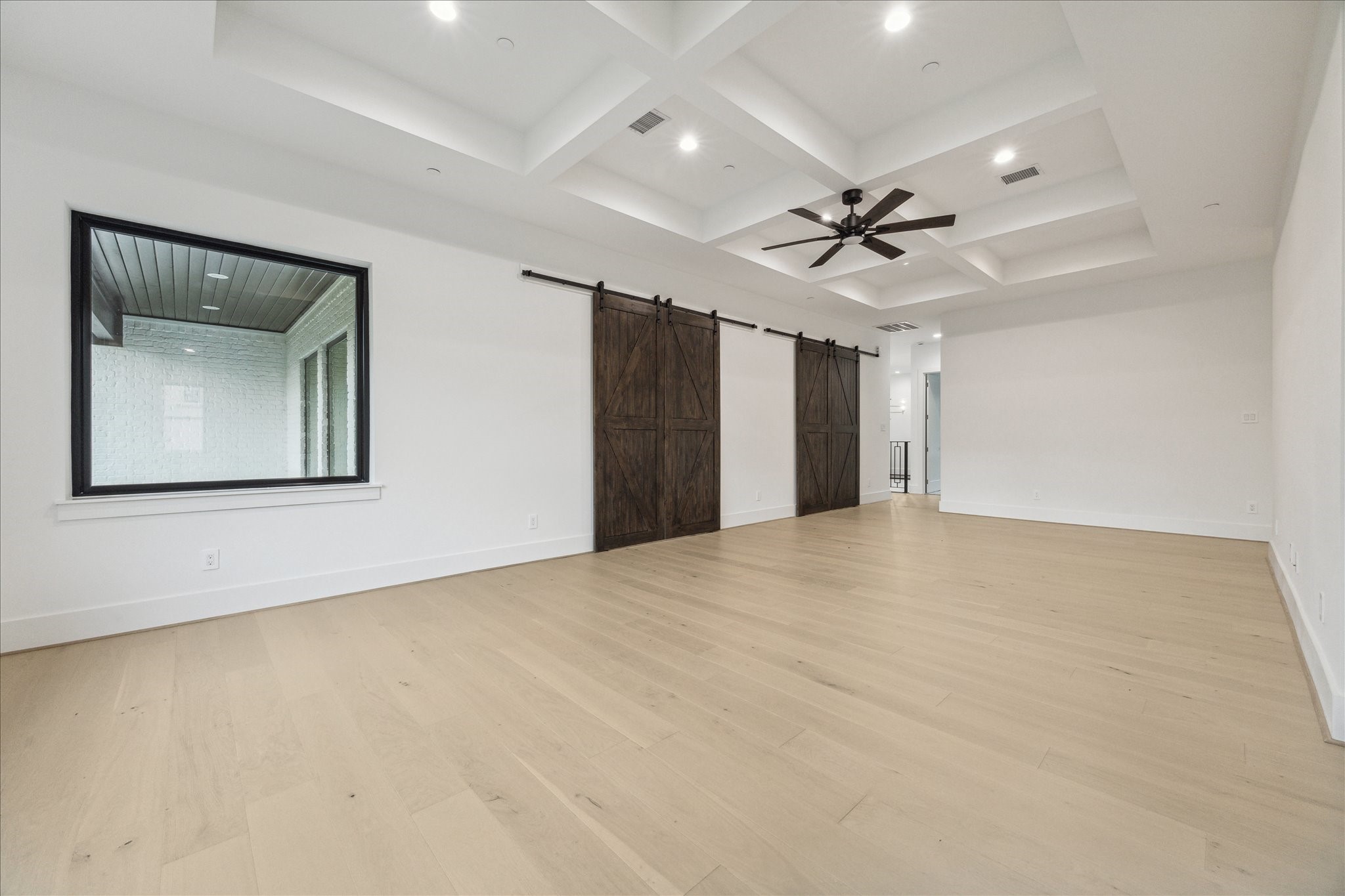 534 Lanecrest Lane Houston, TX 77024 - Photo 29 of 49 a view of an empty room with a ceiling fan