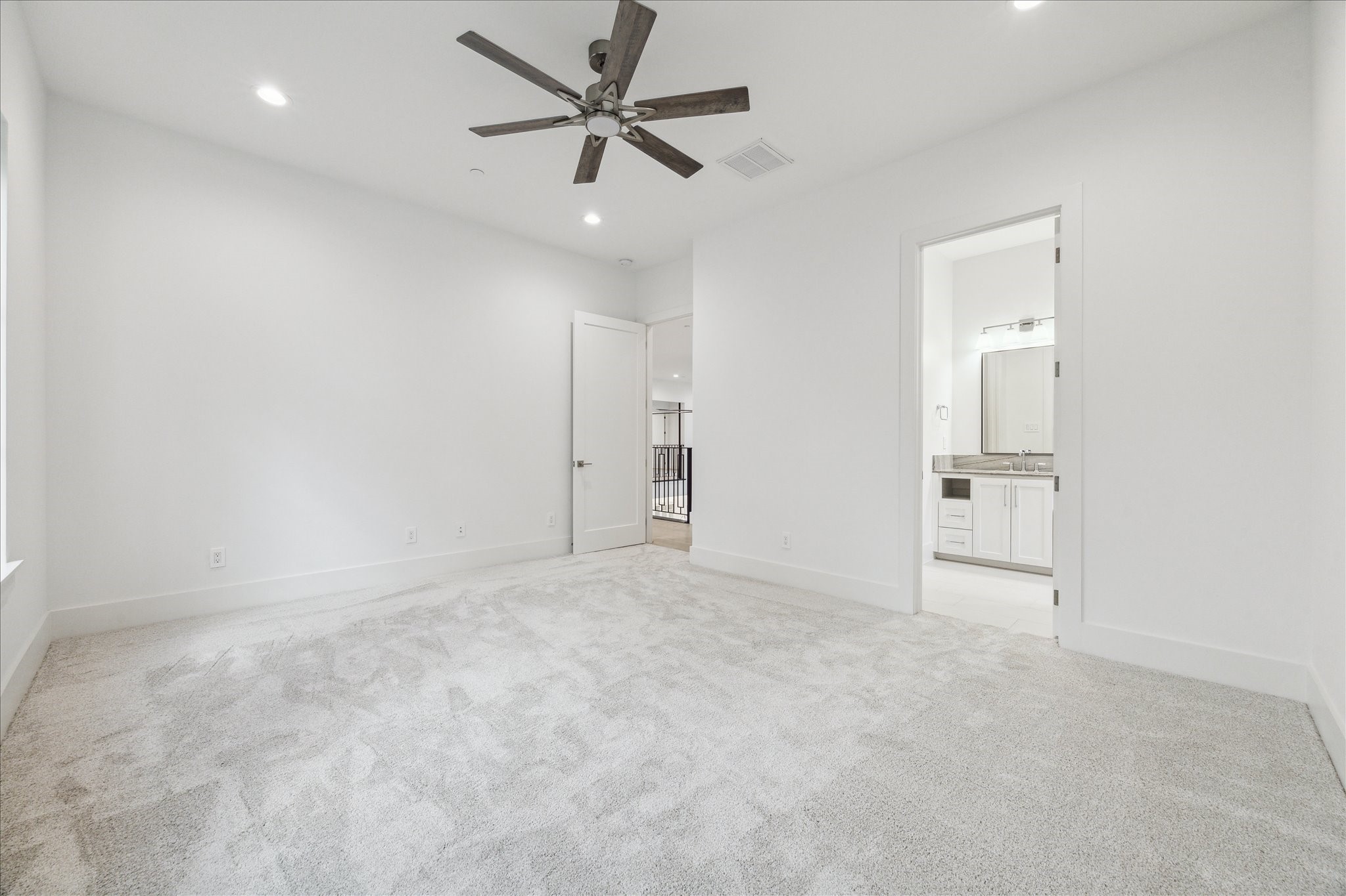 534 Lanecrest Lane Houston, TX 77024 - Photo 36 of 49 an empty room with an entryway and fan