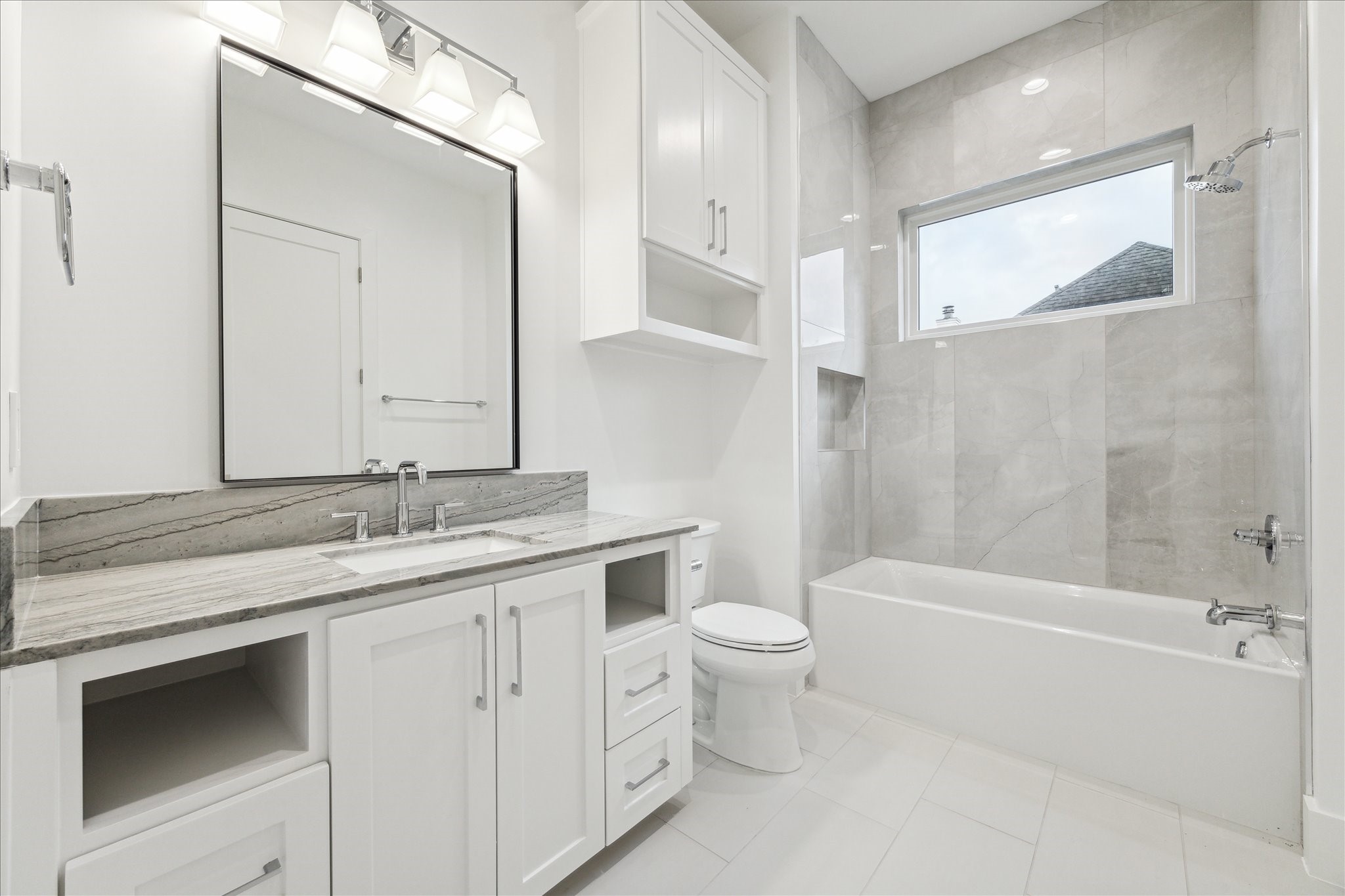 534 Lanecrest Lane Houston, TX 77024 - Photo 37 of 49 a bathroom with a granite countertop sink toilet and shower
