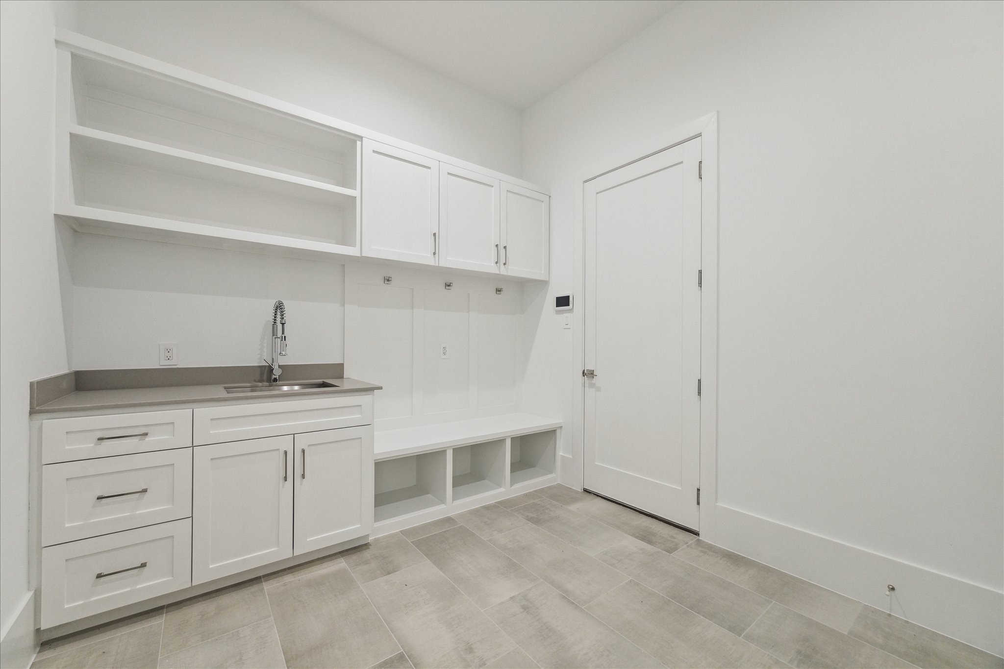 534 Lanecrest Lane Houston, TX 77024 - Photo 43 of 49 a view of cabinets a sink and a stove in a room